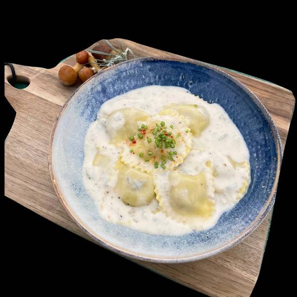 Ravioli ai Porcini Tartufo con Crema di Gorgonzola